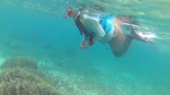 レンタルカメラを楽しむお母さん